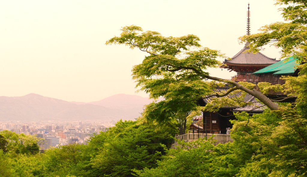 Japanese temple overlooking a Japanese city