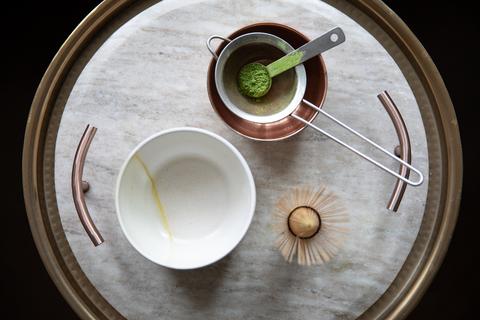 matcha-powder-with-whisk-and-bowl