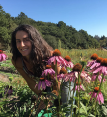 Julie Rothman in a field of flowers